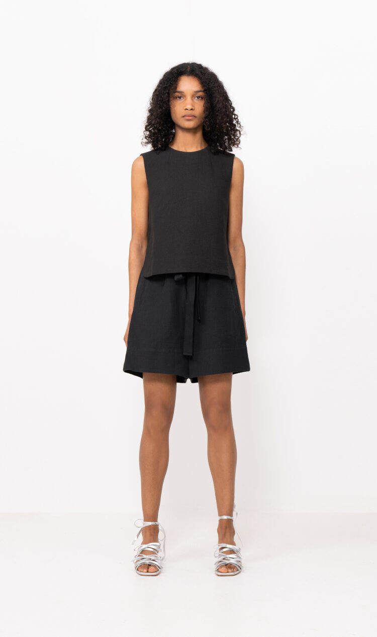 Black sleeveless cropped blouse
