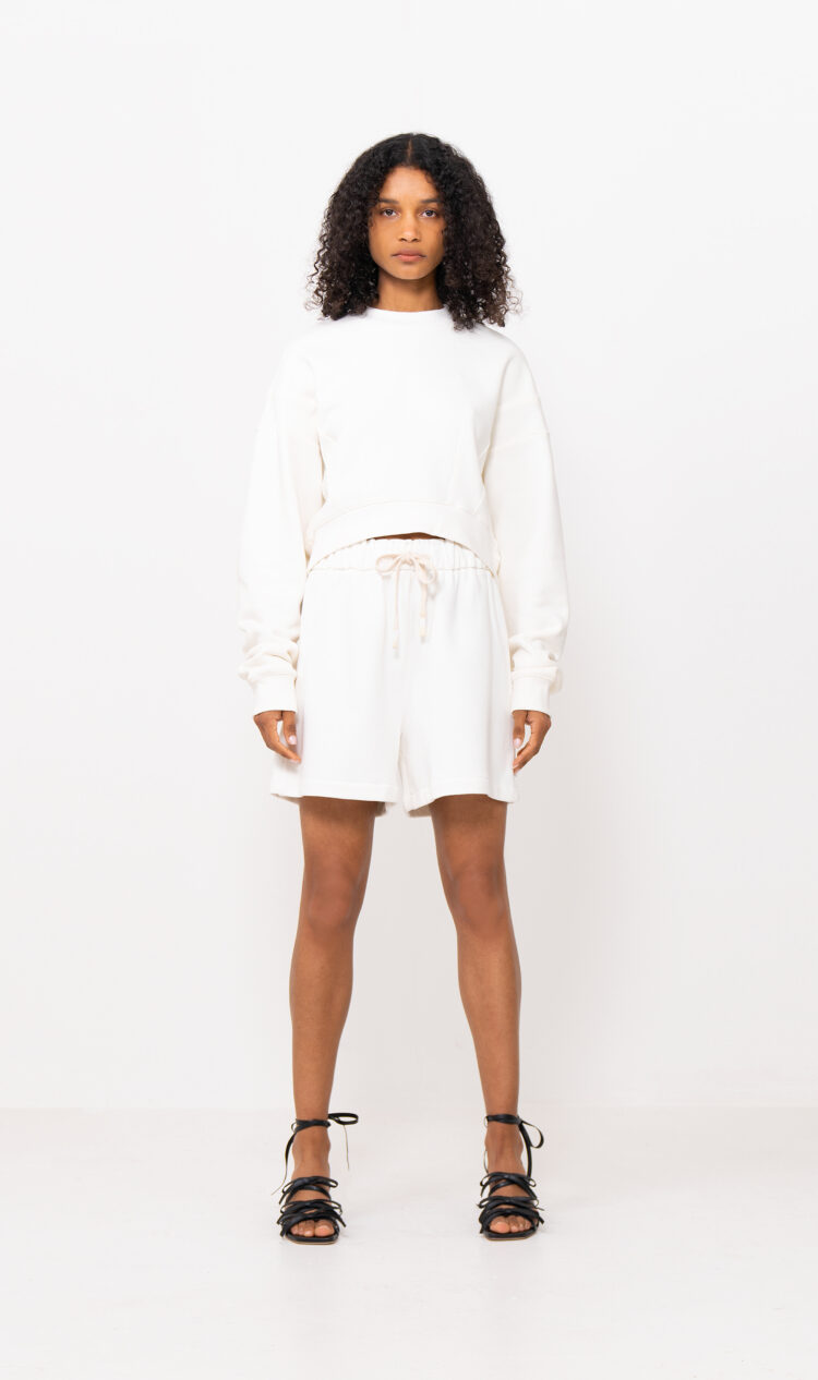 White curved hem sweatshirt