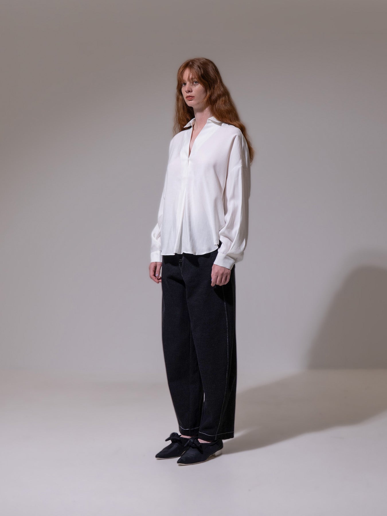 White Curved Hem Blouse