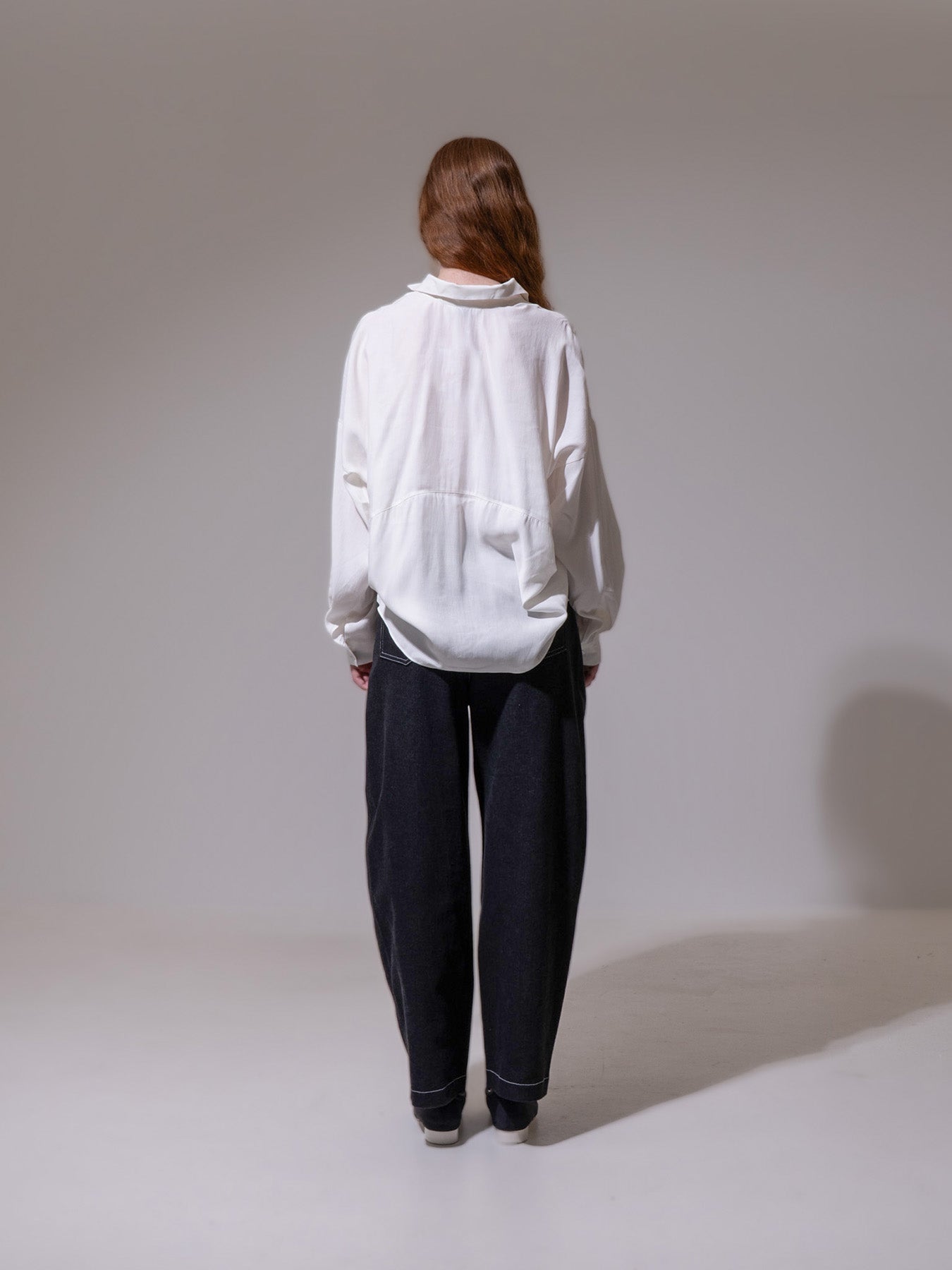 White Curved Hem Blouse