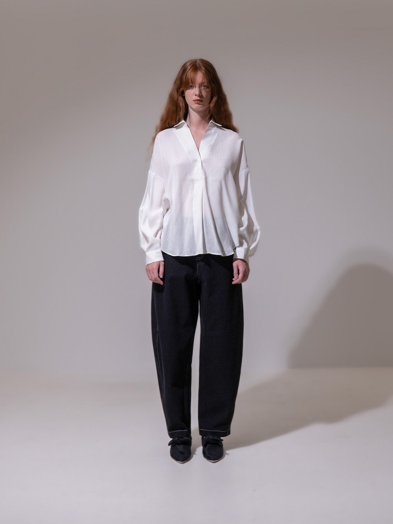 White Curved Hem Blouse